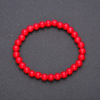 Bracelet made of natural coral pressed on elastic — smooth bead, diameter 6(±)mm, length 18cm