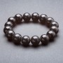 Black elastic bracelet with 12 mm smooth agate beads