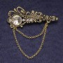 Accent Brooch with White Rhinestones and Crystal, Golden Metal 55×22 mm