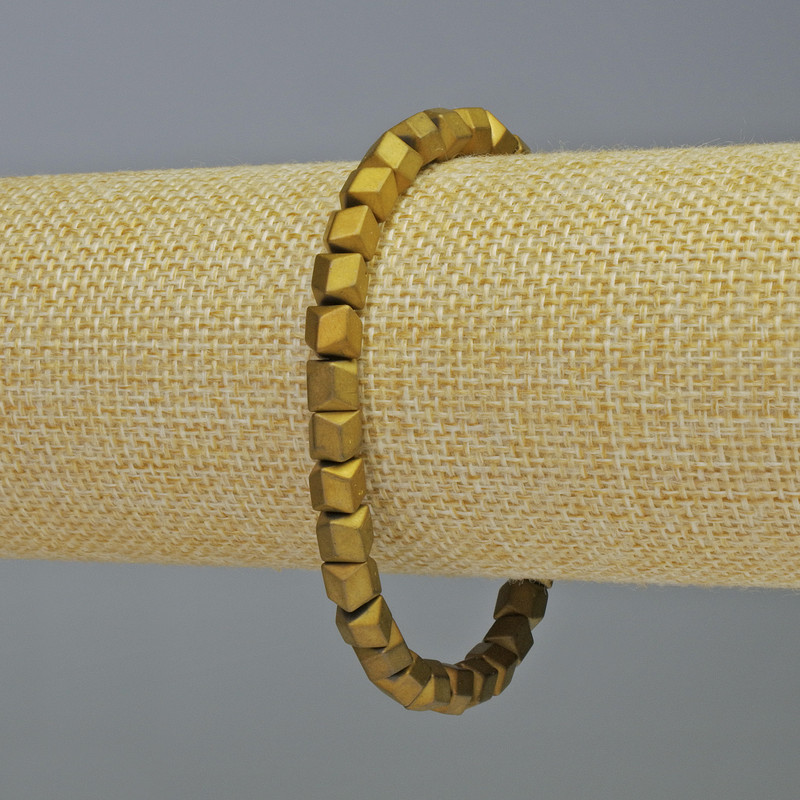 Hematite bracelet with hexagonal zigzag shapes, matte gold color, 6x6 mm diameter, 18 cm length, stretch