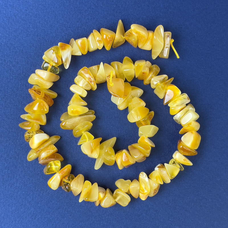 Amber chip beads 11x5 mm on a thread, length 38 cm+