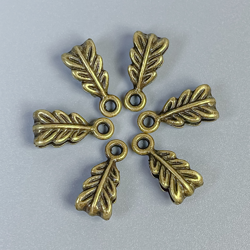 Bronze-colored bail hardware, size 14×7×5 mm, hole diameters 2.5 mm and 1.8 mm, packaging 22 pcs