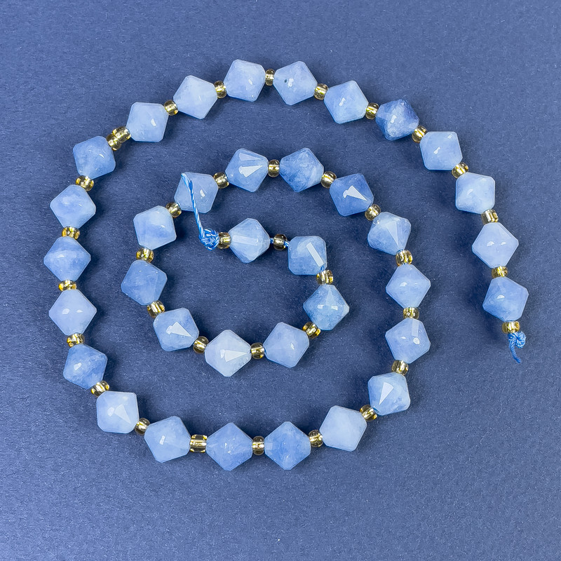 Aquamarine faceted beads, diamond-shaped 8x8 mm, on a thread with beads, length 37 cm+