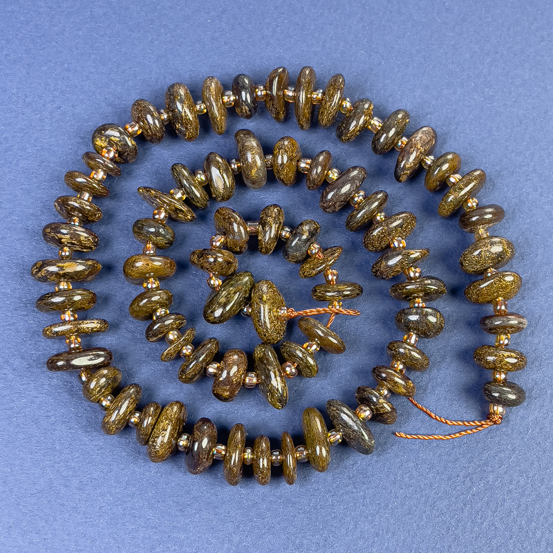 Bronzite Beads, Tumbled 8–10×4 mm, with seed beads on thread, length 40 cm