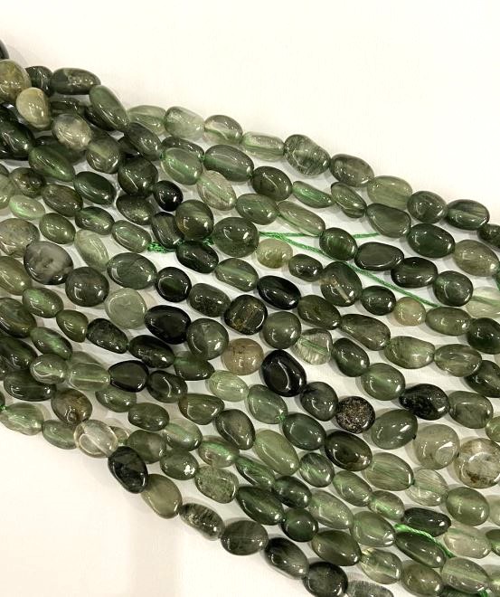 Beads on a thread 'Hairy' Rutile Quartz faceted, 8x6 mm, length 40 cm