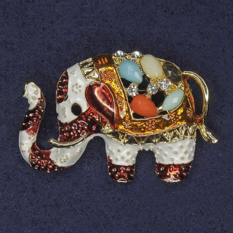 Brooch «Elephant» with crystals and assorted stones, enamel, gold-tone metal, 40×28 mm+