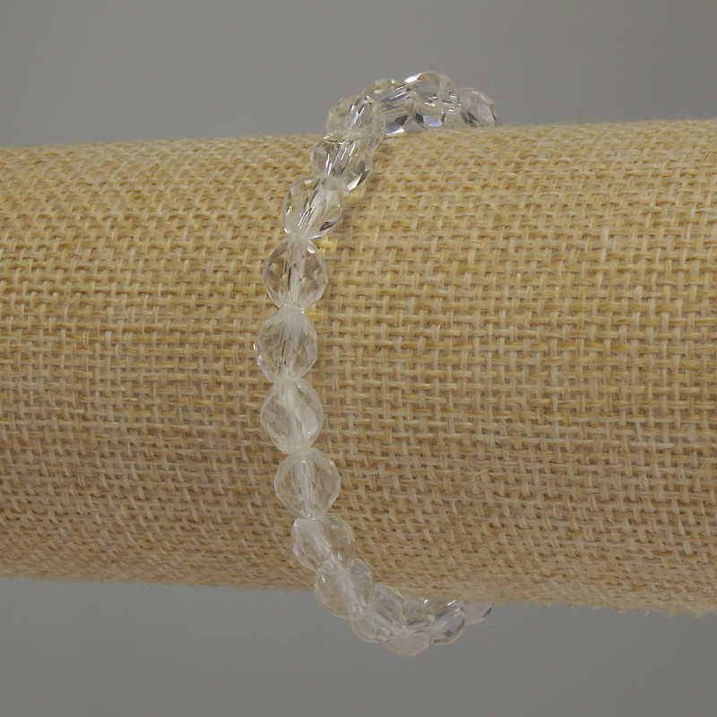 Bracelet with faceted rock crystal bicones, 6 mm diameter, 18 cm length, stretch