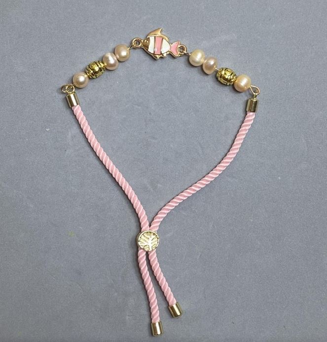 Textile bracelet, diameter 5.5 mm, adjustable, oval pearls 6.5×5.5 mm, with gold-tone metal inserts