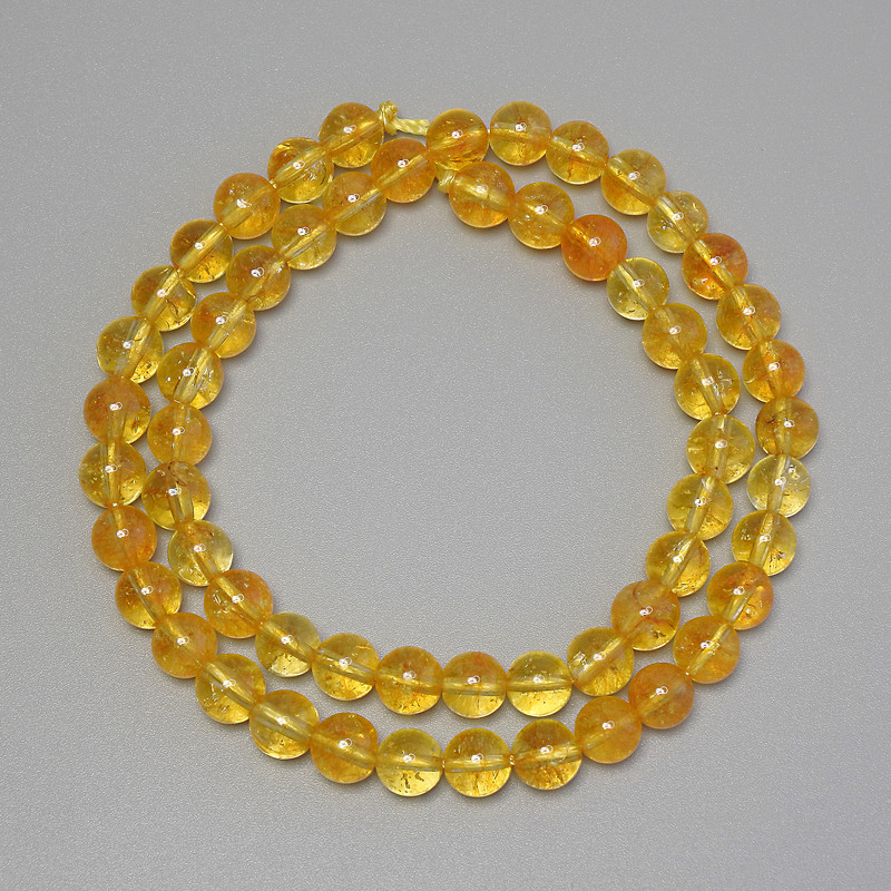 Citrine beads, smooth spheres, 6.5 mm diameter ± on thread, length 37 cm+