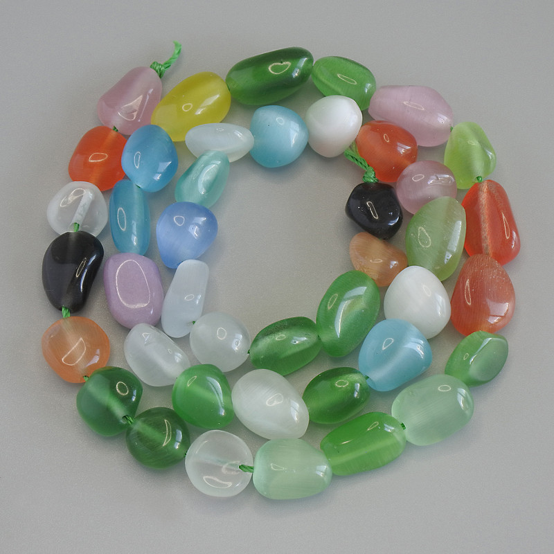 Multicolored Cat's Eye Faceted Beads, diameter 8–12×9 mm, length 41 cm on thread