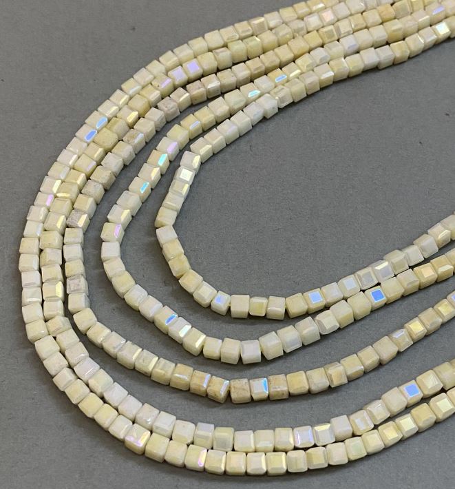 Yellow Czech Crystal Beads with gasoline coating on thread, faceted cube, diameter 4x4 mm, length 38 cm