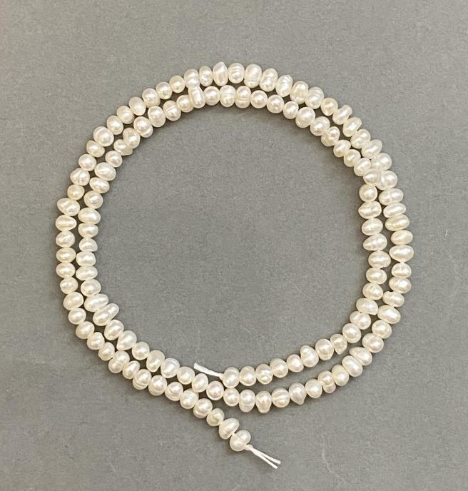 Natural freshwater pearl beads 3x4 mm, approx. 35 cm long on a thread