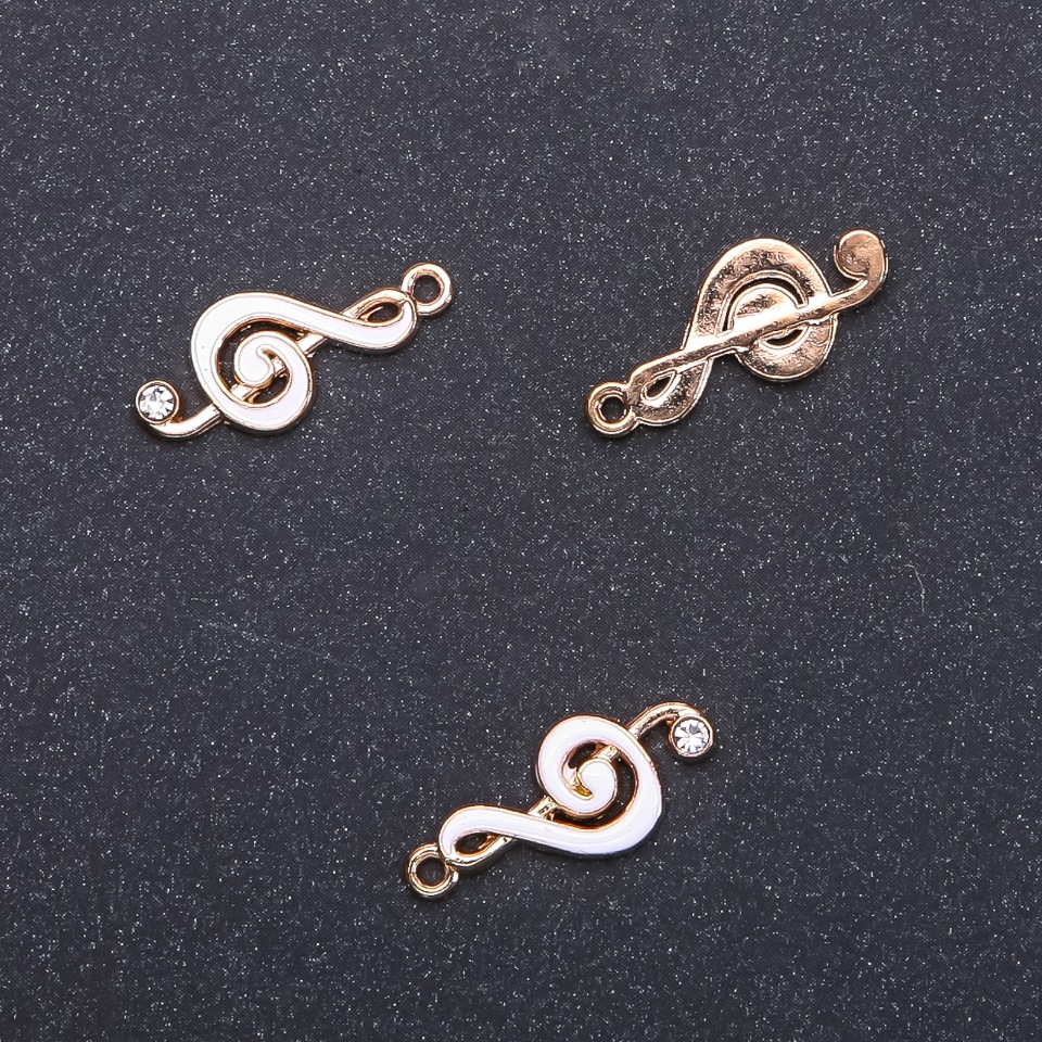 Pendant hardware 'Treble Clef' gold with white enamel, diameter 9 mm, L2m in-, diameter 1.7 mm packaging 9 pcs. (+ -)