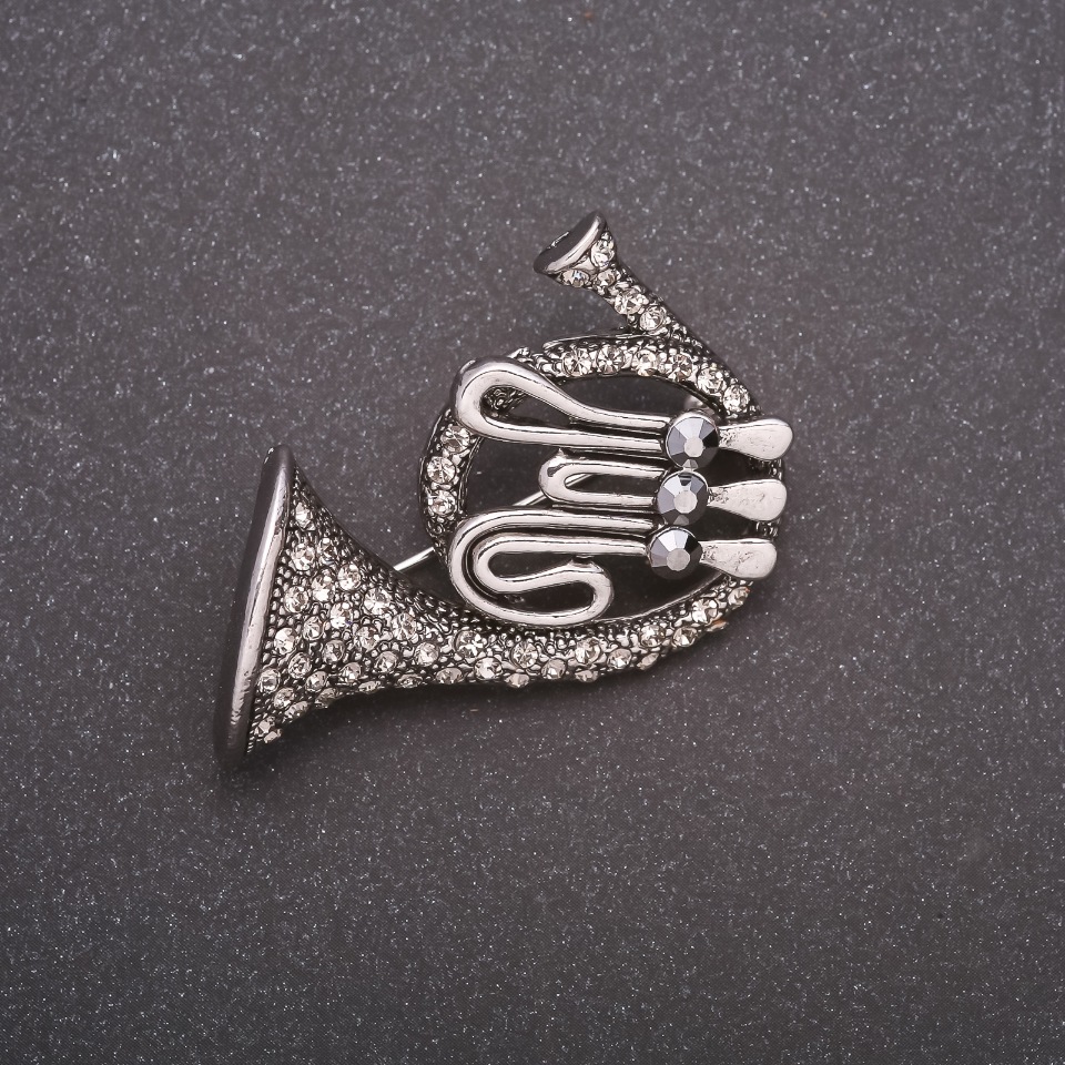 Брошка Труба в стразах сірий метал 42х45мм