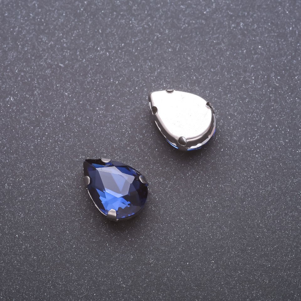 Price per pack / 10 pcs. Sew-on crystal in cap, drop 10×14mm blue