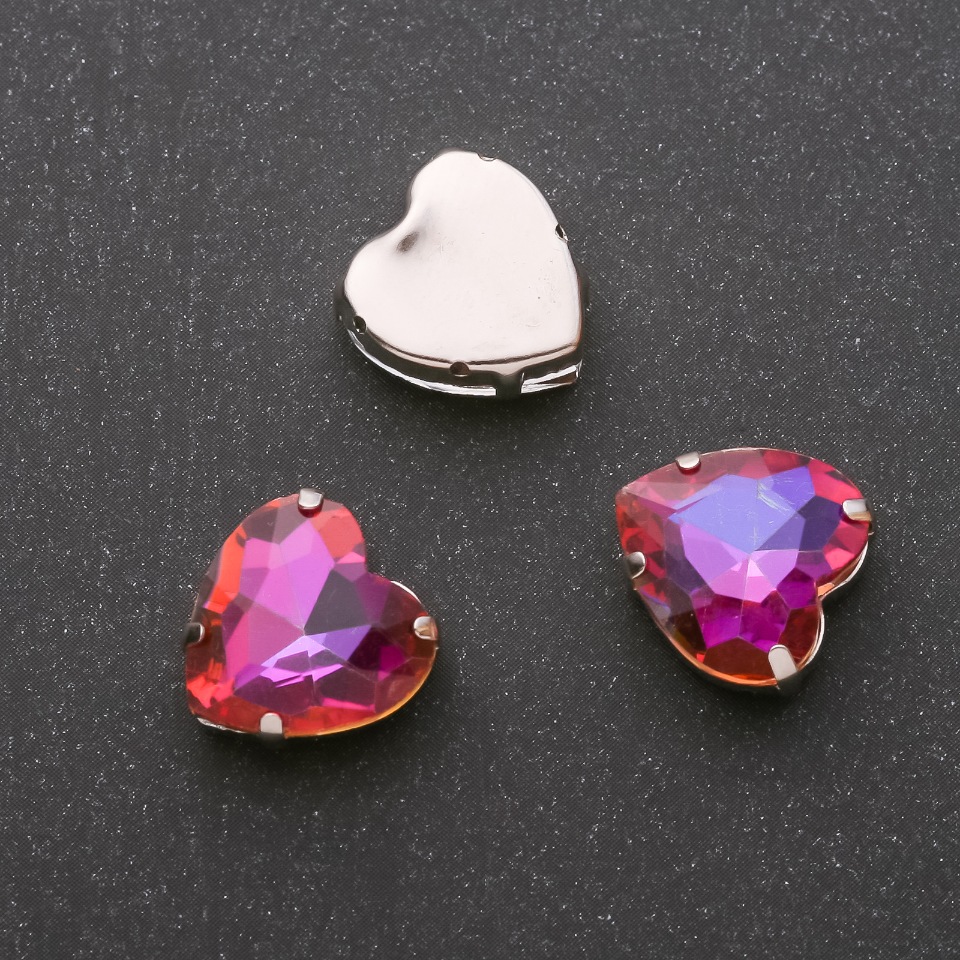 Price per pack / 10 pcs. Sewn-in crystal in a heart-shaped pin 14mm raspberry-orange