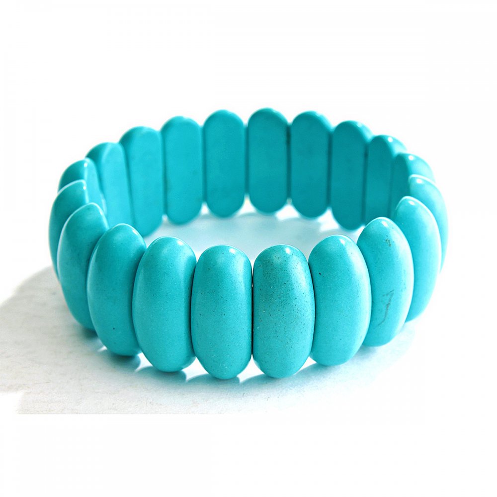 Elastic bracelet blue turquoise with elongated stones 10×25 mm (±)