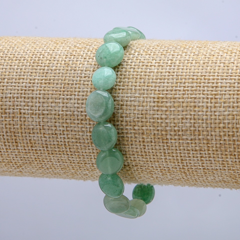 Elastic bracelet with natural jade — round beads, diameter 10 x 9 mm, length 18 cm +
