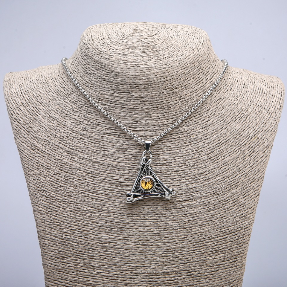 Pendant "Dragon's Eye in a Triangle" 40x35mm on a chain, length 70 cm +/- silver-colored metal