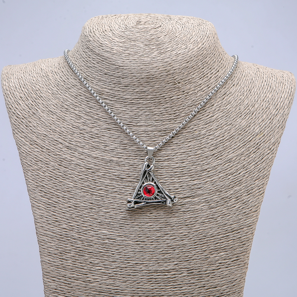 Pendant "Dragon Eye in a Triangle" 40×35 mm on a chain, length 70 cm silver-colored metal