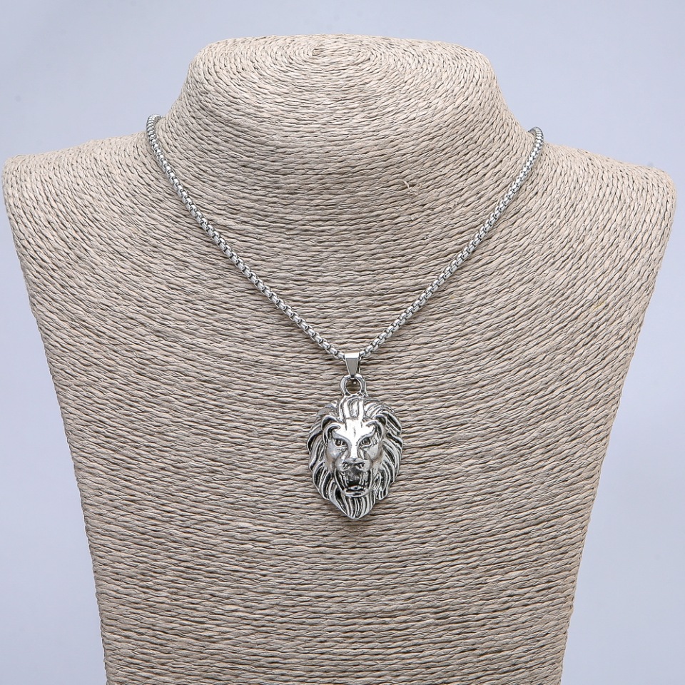 Lion Pendant 45×27 mm on chain, length about 70 cm, silver-colored metal
