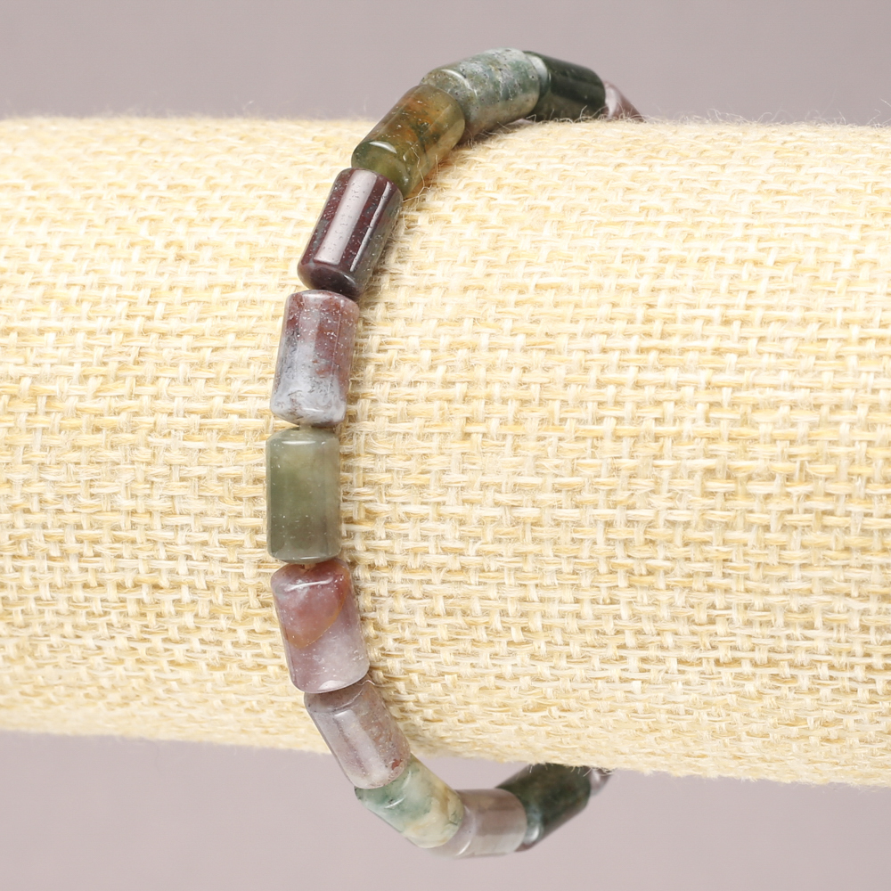 Elastic bracelet with multicolored jasper, smooth cylindrical beads, diameter 10x6 mm+