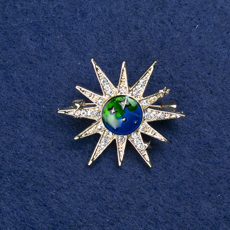 Brooch 'Star' Gold-Tone Metal, Enamel, and Crystals, 32mm +