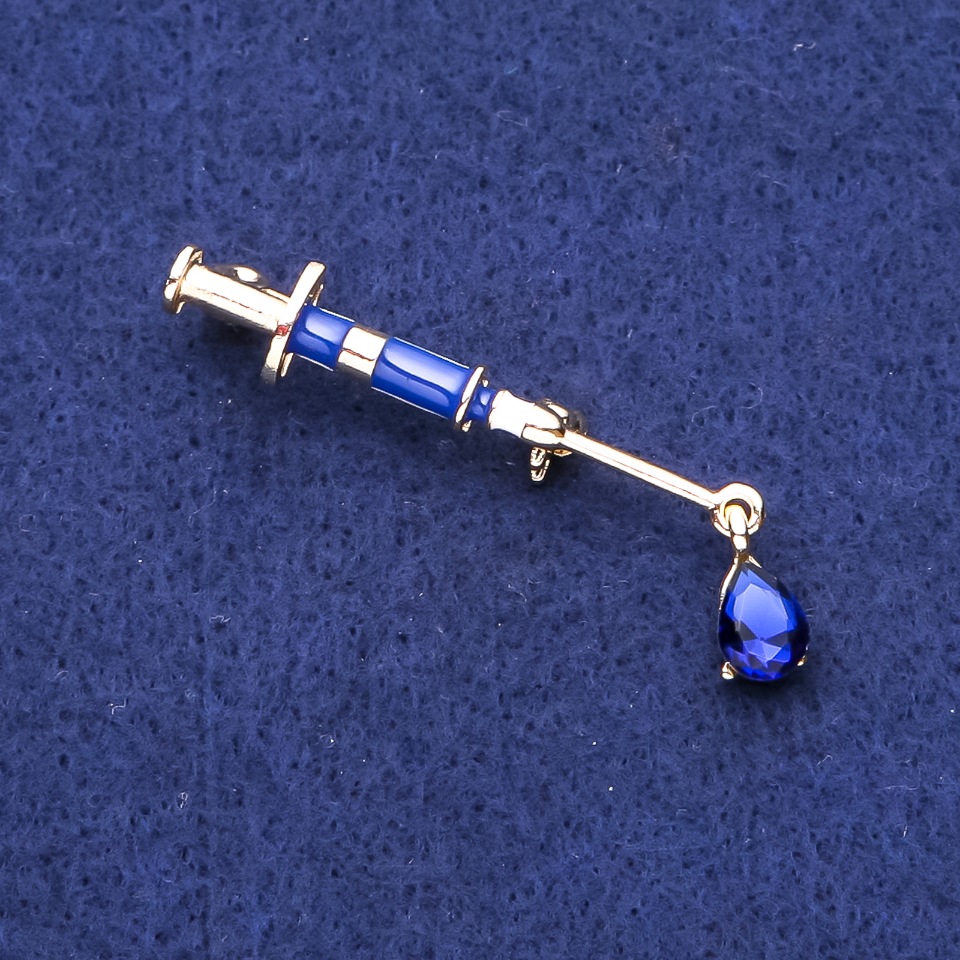 Brooch 'Syringe' with Blue Crystal, Gold-Tone Metal 10×45 mm
