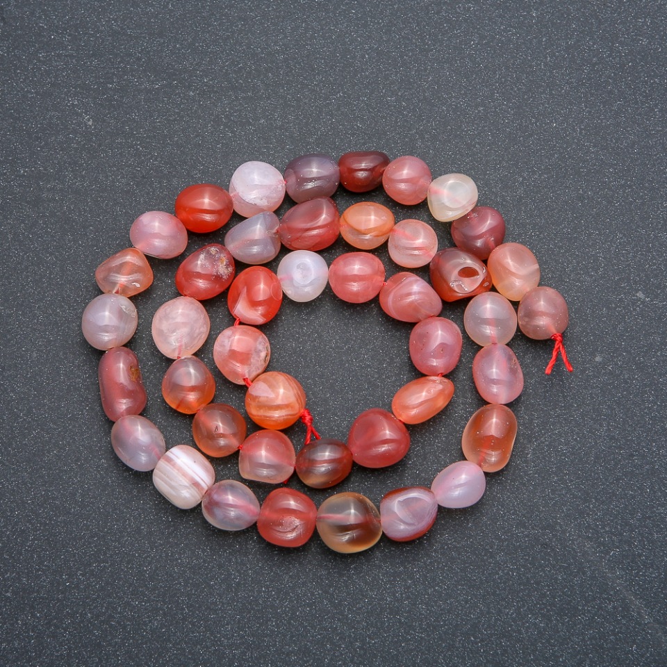 Carnelian beads on a string, round faceted, diameter 8x10 mm, length 40 cm +