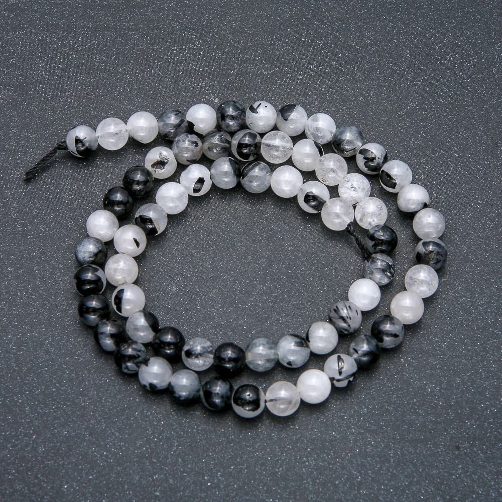 Beads on a thread of natural quartz — smooth round beads, rutilated quartz, diameter 6mm ±, length 39cm