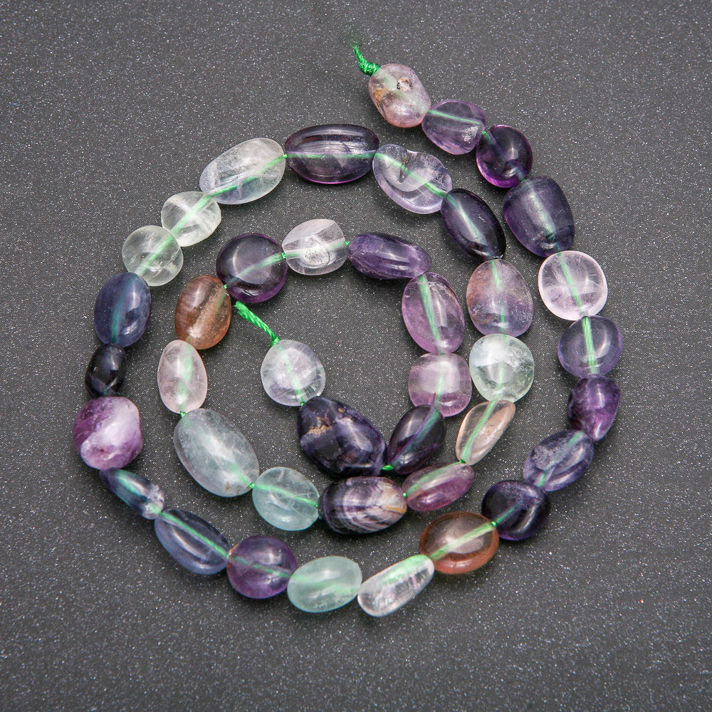 Beads on a strand of natural fluorite, diameter 7–9 mm, length 40 cm