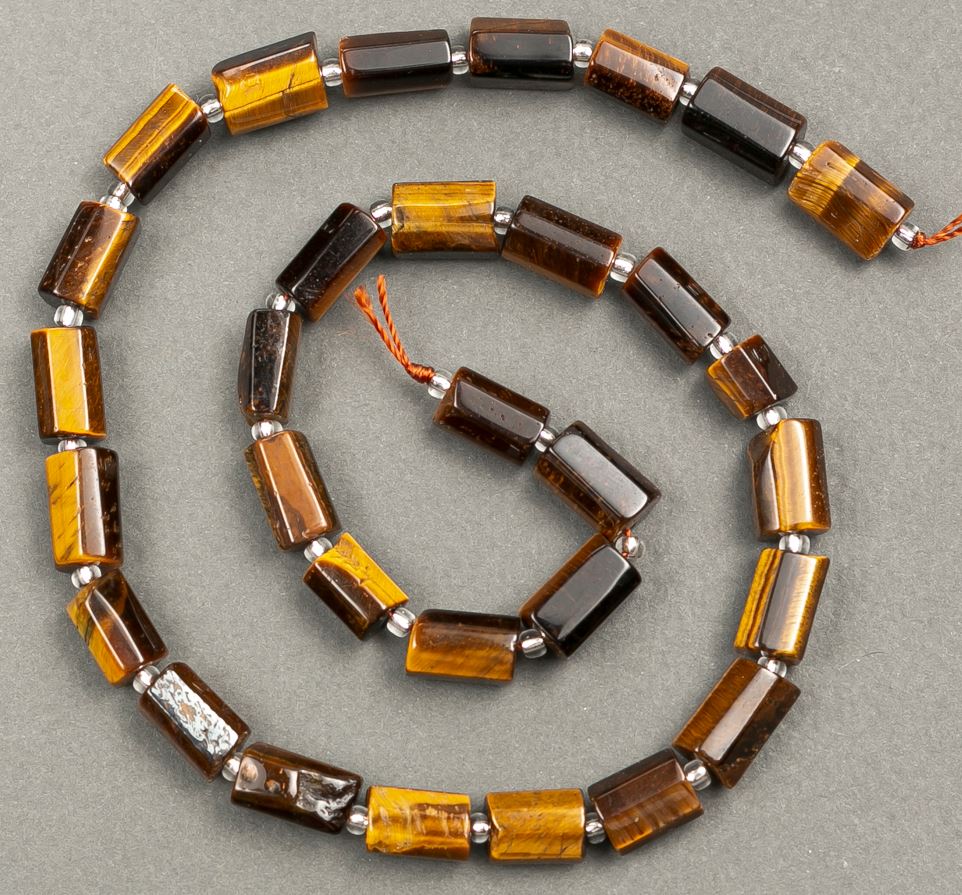 Beads on thread, natural Tiger's Eye, faceted 11x7 mm, length 40 cm+