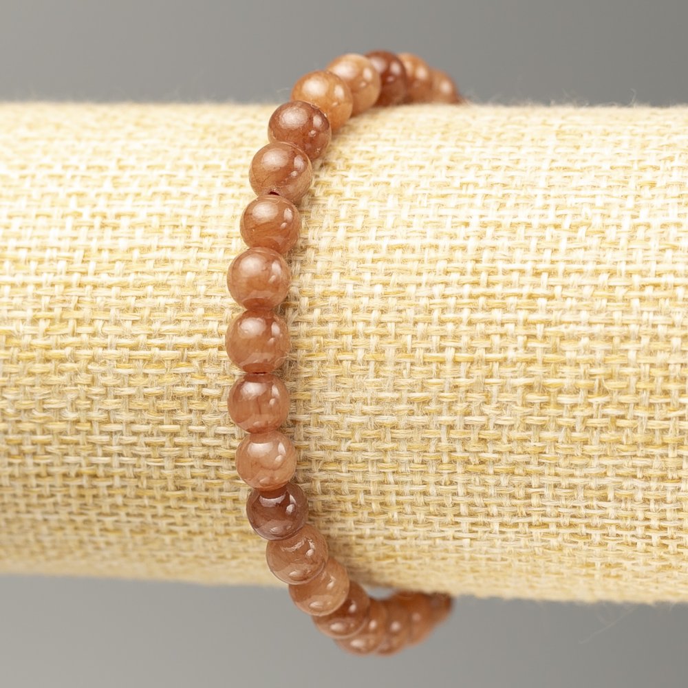 Elastic bracelet with imitation selenite (acrylic smooth beads), 6.5 mm diameter, length 18 cm