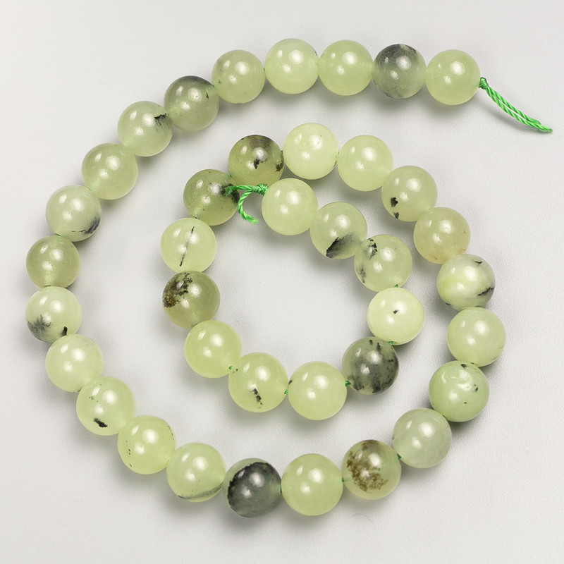 Prehnite beads, smooth round on thread, diameter about 10 mm, length about 38 cm