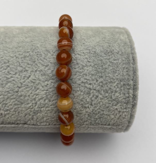 Elastic bracelet with orange agate smooth beads, 6 mm diameter, 18 cm length